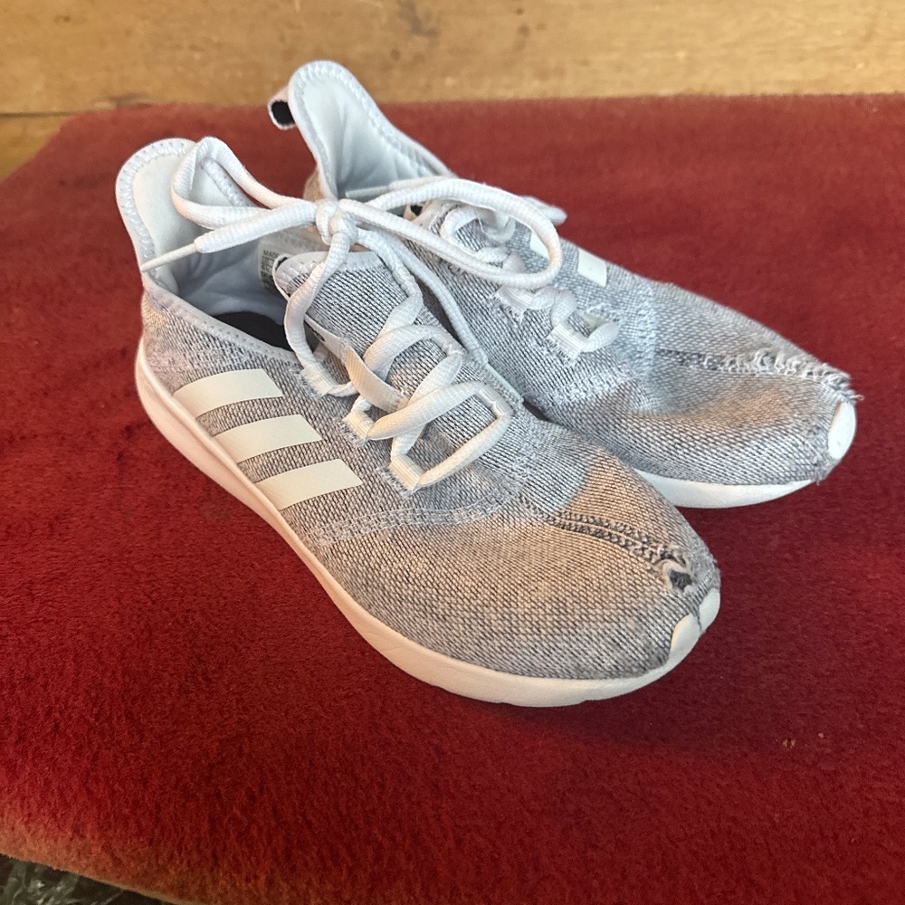 Adidas lady’s 6.5 ripped sneakers. Toe area but still not open